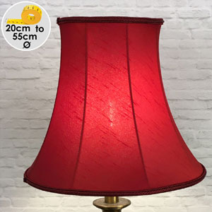 A traditional bell shaped table lamp shade in Red faux silk