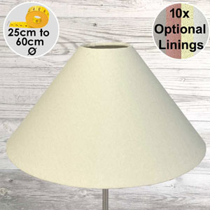 Cream coloured coolie lampshade on a table lamp