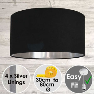 Black pendant drum Lampshade with a Silver lining.